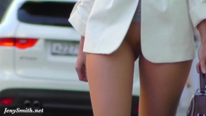 Woman on the street in without panties. Sexy bottomless chick
